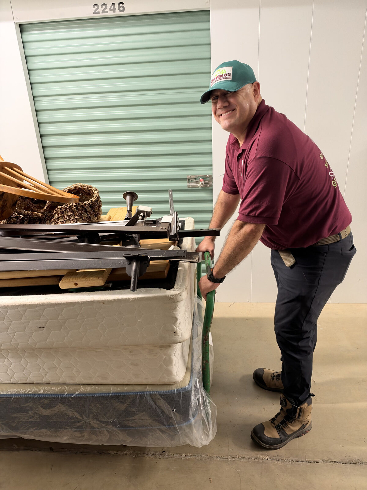 Moving a wrapped mattress out of a storage unit